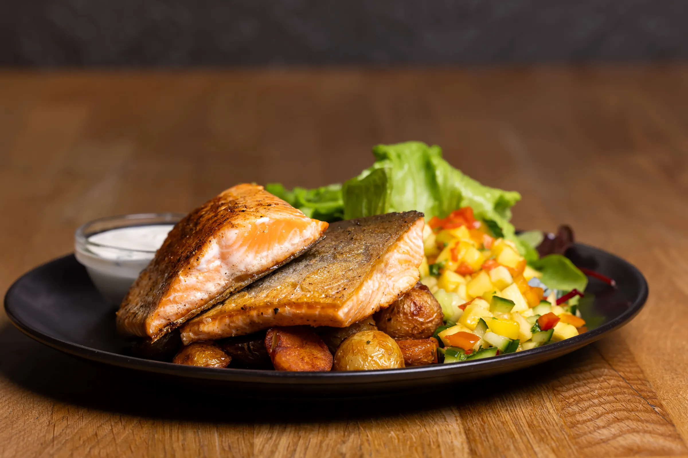Pan-fried Arctic char with potatoes and mango salsa